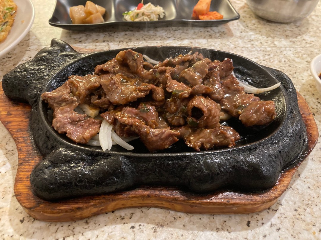 Picture of: The sizzle of sliced and marinated beef short ribs at Seoul Garden in  Cuyahoga Falls